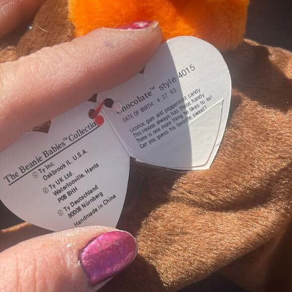 Very rare sticker covering tag ...Ty Beanie baby chocolate the Moose.